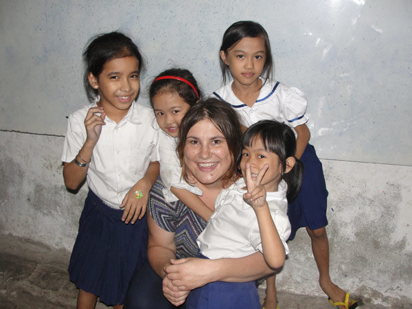 Volunteer with kids in Cambodia