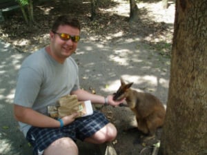 man feeding a kangaroo