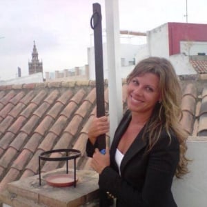woman smiling on a roof