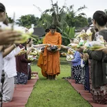 Students visiting with buddhist monks