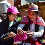 two women weaving