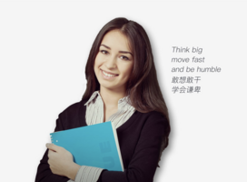 woman holding notebook and smiling in front of a white background