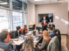 Students meeting w/ a firm