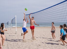 CAMPERS PLAYING BEACH VOLLEY AT IBERIAN CAMPS