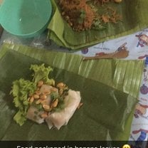 Some yummy food from the evening market wrapped in banana leaves.