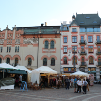 I went to a concert in Plac Szczepanski with bands, dancers, and soloists. There were vendors selling clothing, jewelry, and food.